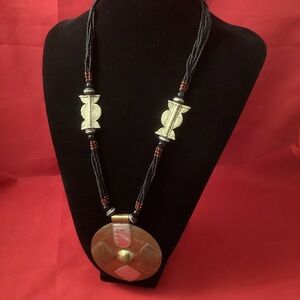 Ethnic brass (?) pendant and beads necklace